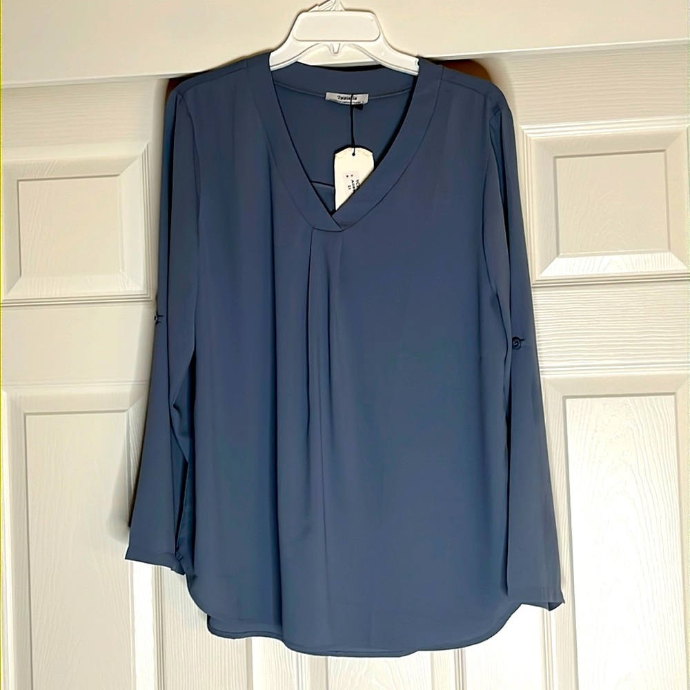 MAT blouse. Button sleeve so you can wear long or 3/4 length.